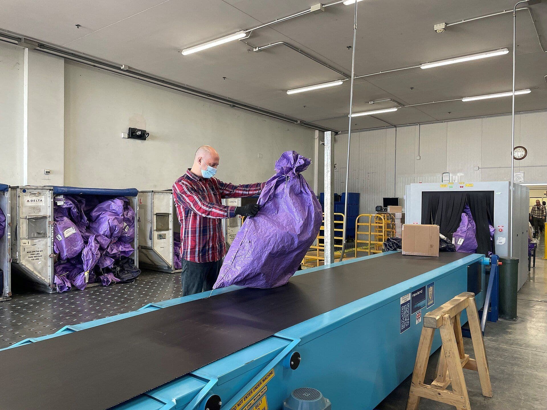Parcels being handled on a sorting conveyor